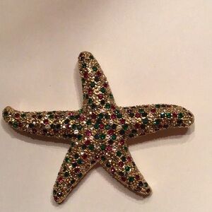 New Goldtone Starfish, set with red,green & clear crystals.